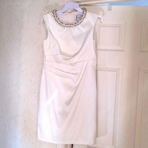 Beautiful Ivory sleeveless dress with Ornate neckline with faux pearls & beads